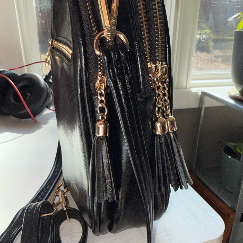 Forever Young Sleek Black Backpack